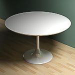 <br>White round dining table - 
designed by...