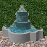 A decorative fountain for patios in colonial or sp...