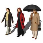 Three women dressed in winter 
clothing.