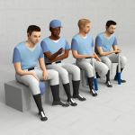 Four models of sitting baseball 
players.