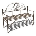 Spanish style wrought iron bench with a rustic fin...