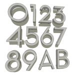 Set of stainless steel house numbers, and two lett...